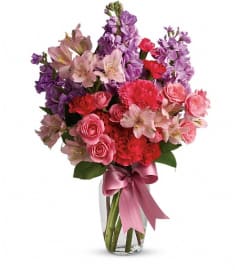 Jumping for Joy. An arrangement by Devine Orchid.