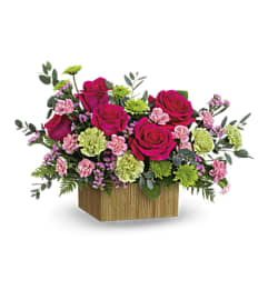 The Teleflora’s Chasing Sunsets Bouquet. An arrangement by Marivel's Florist and Gifts.