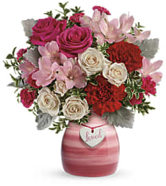 Teleflora's Painted In Love Arrangement. An arrangement by Artistic Way Flowers.