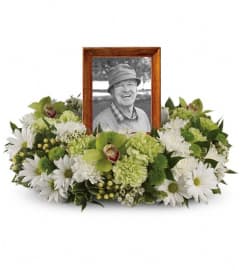 Garden Wreath. An arrangement by Wasaga Flowers.