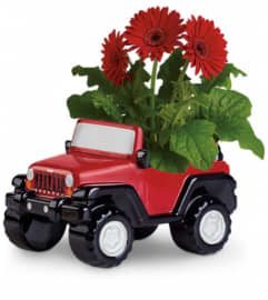Teleflora's Freewheelin' Jeep® Wrangler. An arrangement by Pompano Beach Floral.