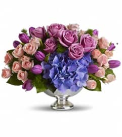 Teleflora's Purple Elegance Centerpiece. An arrangement by GardeLina Flowers.