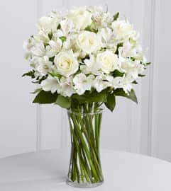cherished friends. An arrangement by Fine's Flowers.
