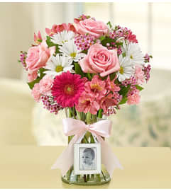 Sweet Baby Girl™ in a Clear Vase. An arrangement by Garden of Eden Floral.