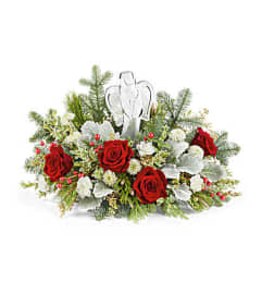 The Teleflora's Joy To The World Bouquet. An arrangement by Marivel's Florist and Gifts.