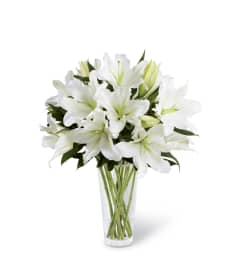 The FTD® Light In Your Honor™ Bouquet. An arrangement by Mystic Garden Floral.