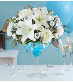 Cheers to the New Year™. An arrangement by Blessing and Blooms Florist.