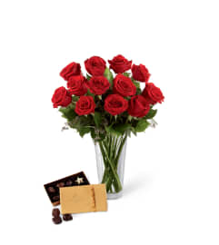 The FTD® Red Rose and Godiva® Bouquet. An arrangement by Cal's Grower Direct.