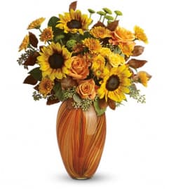 Teleflora's Golden Sunset Bouquet. An arrangement by Pompano Beach Floral.