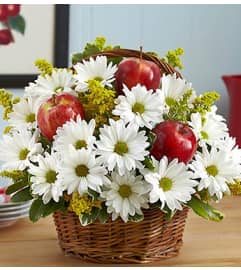 Apple of My Eye™. An arrangement by Blessing and Blooms Florist.