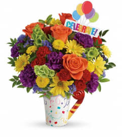 Teleflora's Celebrate You Bouquet. An arrangement by Marivel's Florist and Gifts.