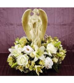 SYMPATHY ARRANGEMENT WITH ANGEL. An arrangement by Dupree's Root 88 Garden Center and Florist.
