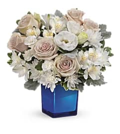 Teleflora’s Serene Sky Bouquet. An arrangement by GardeLina Flowers.