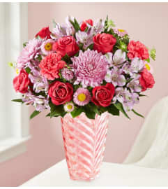Sweetheart Medley™ in a Pink Vase. An arrangement by Graceland Florist. Sweetheart Medley™ in a Pink Vase. An arrangement by Graceland Florist.