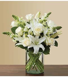 Classic All-White Arrangement. An arrangement by Blessing and Blooms Florist.