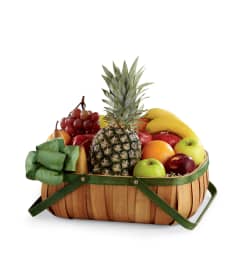 The FTD® Thoughtful Gesture™ Basket. An arrangement by Royal Louis Florist.