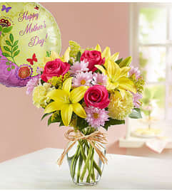 Bunches of Love for Mom. An arrangement by Graceland Florist.