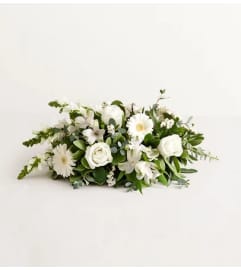 Sussex Meadow™ Centerpiece. An arrangement by Sicola's Florist.