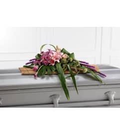 The FTD® Affection™ Casket Spray. An arrangement by Mystic Garden Floral.