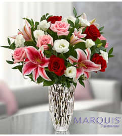 Marquis by Waterford® Red Rose and Lily. An arrangement by Blessing and Blooms Florist.