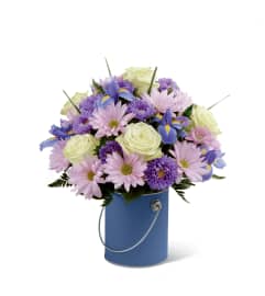 The FTD® Color Your Day With Tranquility. An arrangement by Sandy's Florist.