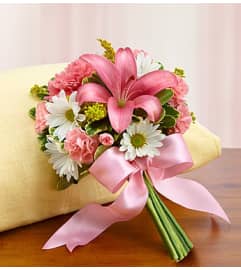 Handtied Bouquet. An arrangement by Blessing and Blooms Florist.