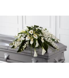 The FTD® Angel Wings™ Casket Spray. An arrangement by Mystic Garden Floral.