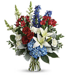 Teleflora's Colorful Tribute. An arrangement by Pompano Beach Floral.