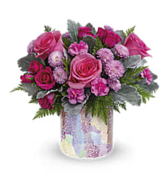 Teleflora's Playful Daisy. An arrangement by Margaret's Florist.