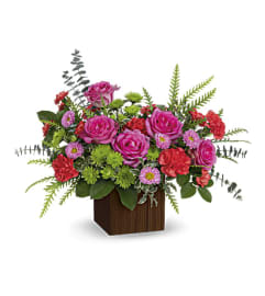 The Teleflora's Catch The Sun Bouquet. An arrangement by Marivel's Florist and Gifts.