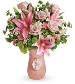 Teleflora's Elegance In Flight Bouquet. An arrangement by Devine Orchid.