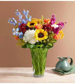 Fall Devotion™ Bouquet. An arrangement by Susana's Flowers.