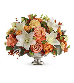 Teleflora's Harvest Shimmer Centerpiece. An arrangement by Pompano Beach Floral.