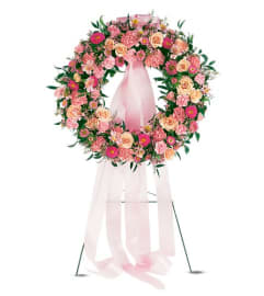 The Respectful Pink Wreath. An arrangement by The Flower Boutique.