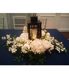 sympathy lantern arrangement. An arrangement by Dupree's Root 88 Garden Center and Florist.