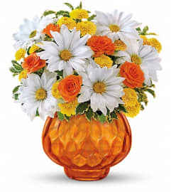 Teleflora's Rise and Sunshine. An arrangement by Pompano Beach Floral.