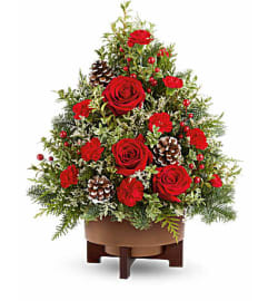 The Teleflora's Season's Greetings Tree. An arrangement by Marivel's Florist and Gifts.