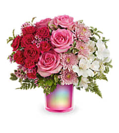 The Teleflora's Gemstone Radiance Bouquet. An arrangement by Marivel's Florist and Gifts.
