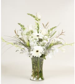 Heavenly. An arrangement by A Plus Flowers and Gifts.