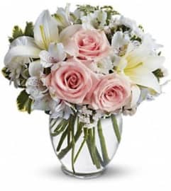 Stylish Arrival. An arrangement by Awesome Blossom.