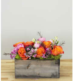 Desert Sunset. An arrangement by Twigs Flower Company. Desert Sunset. An arrangement by Twigs Flower Company.