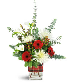 Holiday Surprise. An arrangement by North Creek Florist.