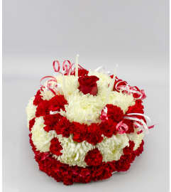 Floral Birthday Cake. An arrangement by Just Roses Flowers and More.