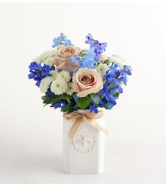 The Honey Bee Buzz™ Delphinium Bouquet. An arrangement by Sicola's Florist.