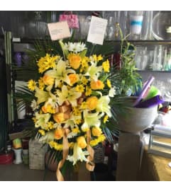 Funeral arrangement. An arrangement by Flamingo Floral and Gifts. Funeral arrangement. An arrangement by Flamingo Floral and Gifts.