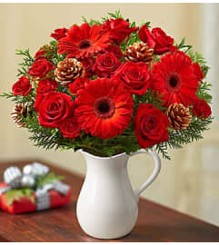 Holiday Wishes in a Pitcher. An arrangement by 1800flowers Encinitas. Holiday Wishes in a Pitcher. An arrangement by 1800flowers Encinitas.