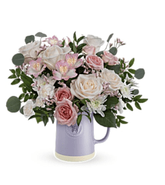 A Teleflora's Blossom Delight Bouquet. An arrangement by Marivel's Florist and Gifts.