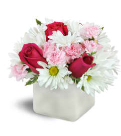 Vibrant Blooms™. An arrangement by The Flower Shop.