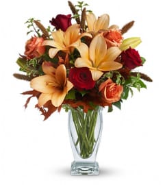 Teleflora's Fall Fantasia. An arrangement by Pompano Beach Floral.