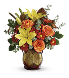 Teleflora's Citrus Harvest Bouquet. An arrangement by Pompano Beach Floral.